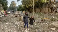 Massive Russian attack on cities across Ukraine kills at least 16 people