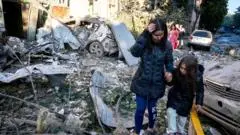 Ukraine rescuers pull dead from rubble after Russian strikes kill 22 people