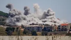 Israeli strikes kill nine in Lebanon as Hezbollah fires rockets over border