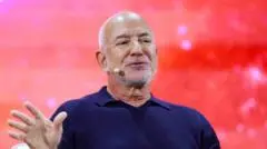 AI will create more jobs for humans, not replace them, Amazon founder Bezos says