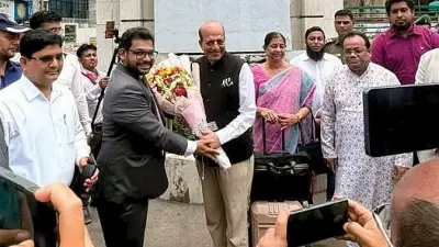 A welcome in Dhaka, a hold-up in Delhi