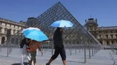 Power outages hit France as it records hottest day since measurements began