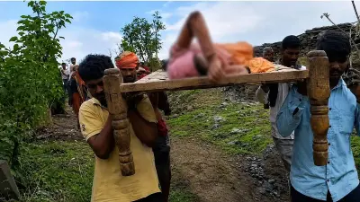 Woman gives birth while being carried across river on cot in MP village
