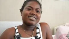 Aunt of Venezuelan boy pulled from rubble tells BBC she will give him 'mother's warmth'