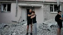 At least 13 killed in large-scale Russian missile and drone strikes on Kyiv
