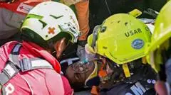 Venezuela quake survivor pulled out alive after eight days