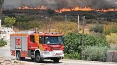 Wildfire in southern Spain leaves at least 12 dead and 23 missing