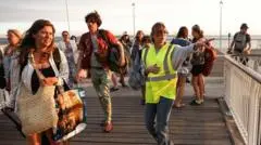 Tens of thousands evacuated from French tourist spot as wildfires spread