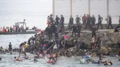 Spain's PM blames traffickers after 60,000 migrants reach Ceuta from Morocco