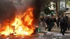 France halts use of stun grenades after boy's hand blown off in student protests